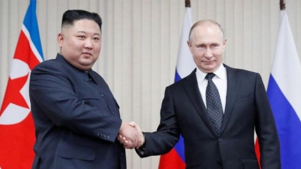 Russian President Vladimir Putin (R) and North Korean leader Kim Jong Un shakes hands during their talks at Far East Federal University on Russky Island in Vladivostok, Russia, April 25, 2019.